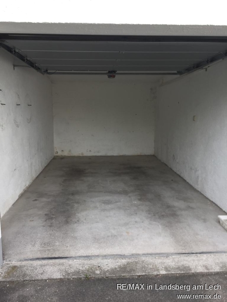 Garage zu OG Mehrfamilienhaus Scheuring