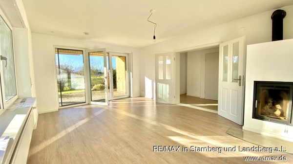 Wohnzimmer mit Holzofen Einfamilienhaus Landsberg am Lech