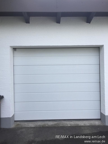 Garage zu OG Mehrfamilienhaus Scheuring